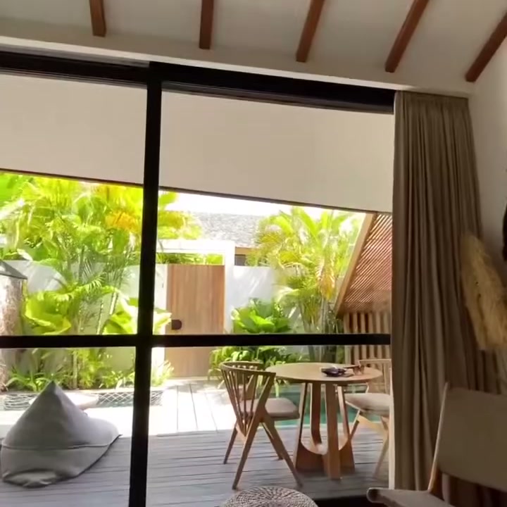 Indoor-outdoor living with tropical landscaping