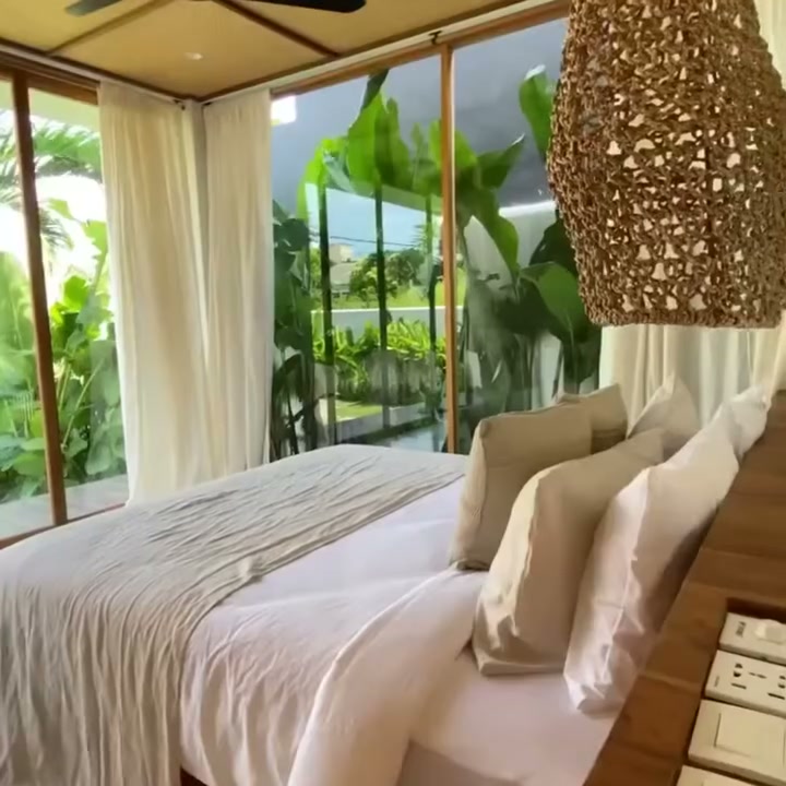 Bedroom opening to private green sit-out