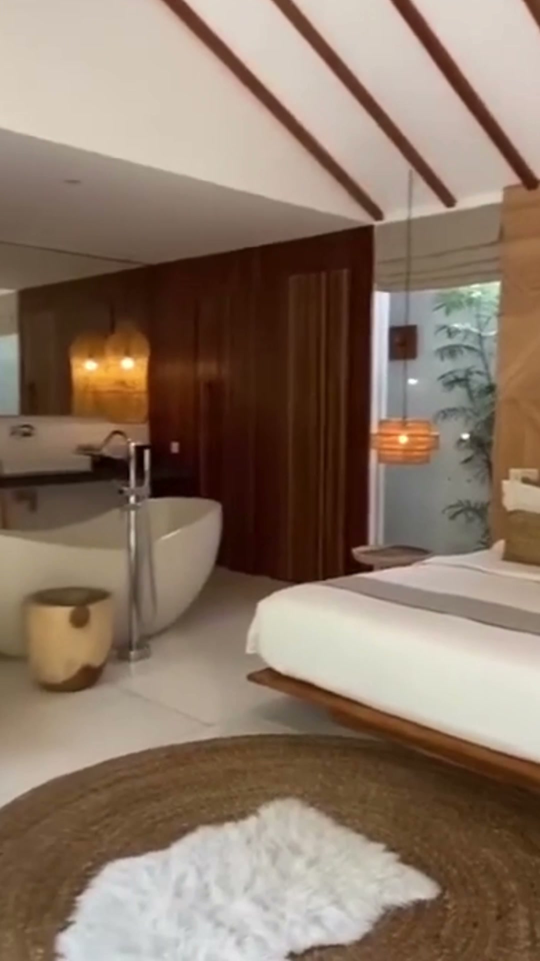 Resort-style master suite with garden view